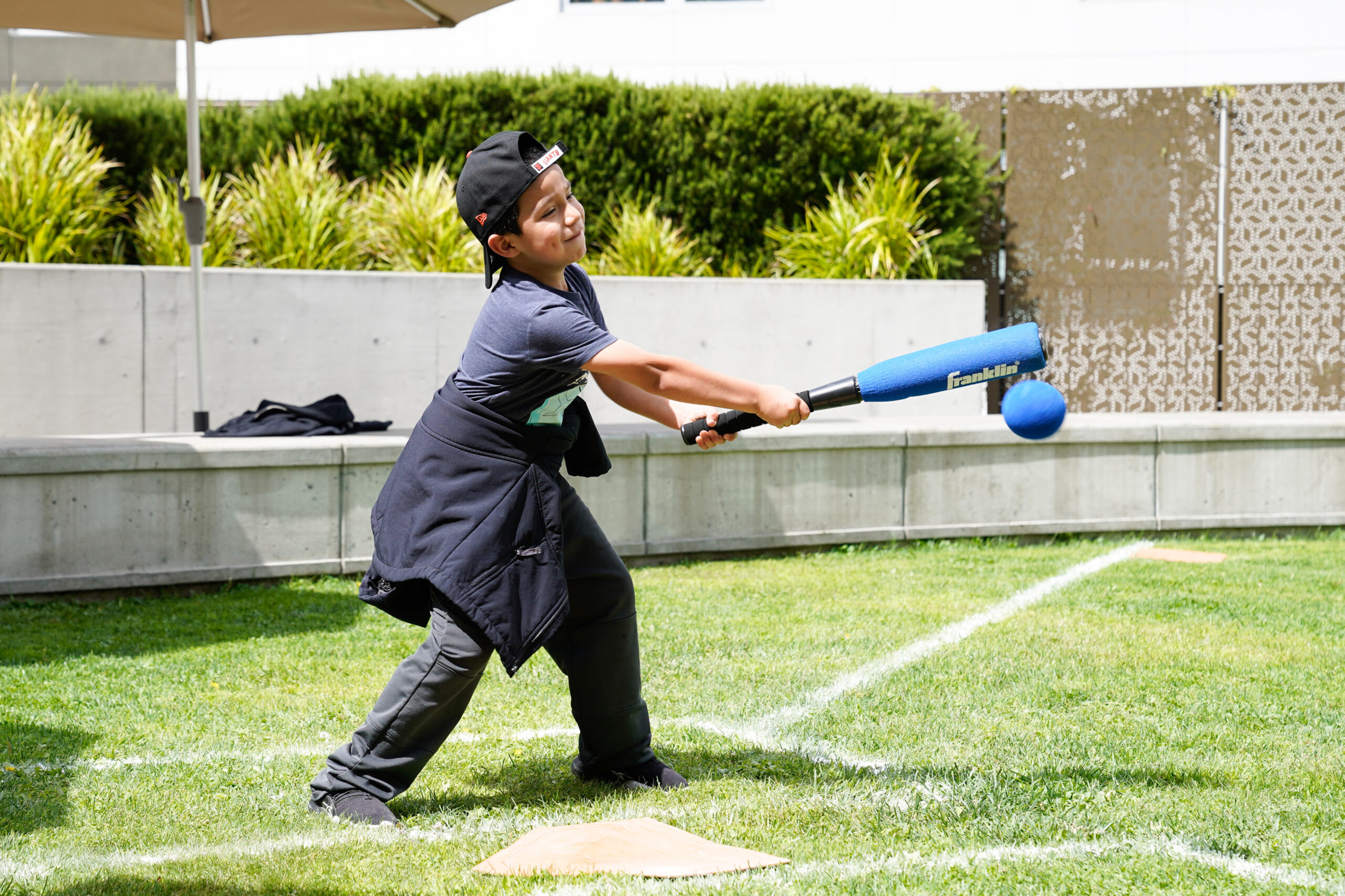 boy playing tball
