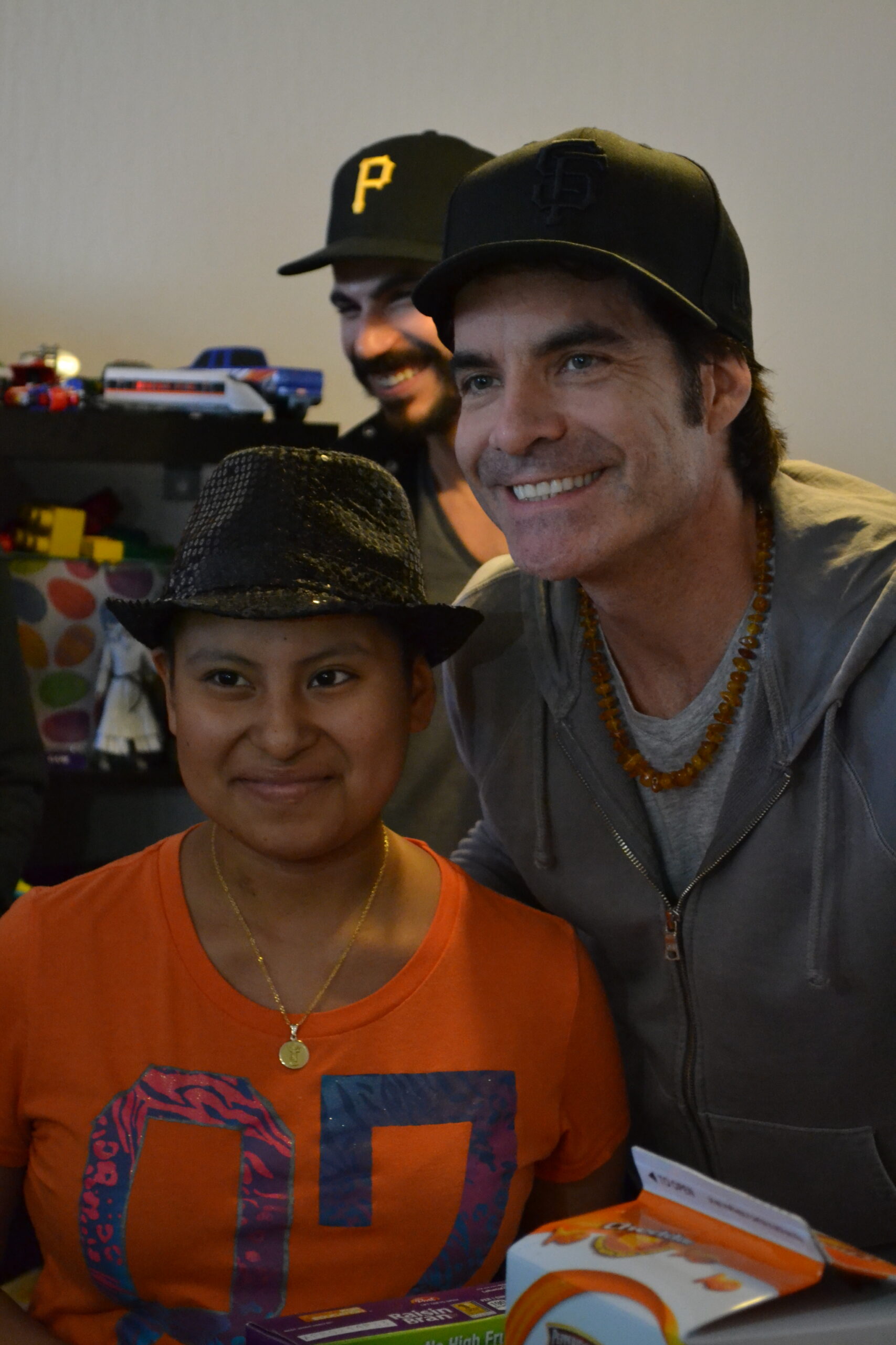 Pat Monahan with a smiling child