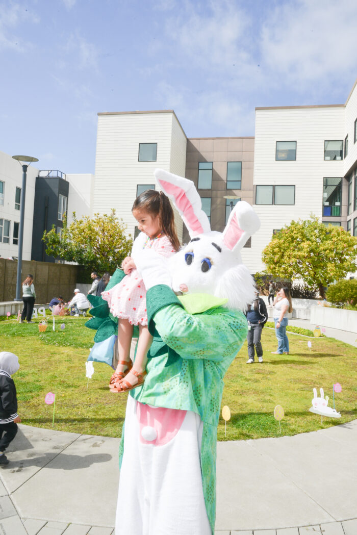 easter bunny holding a child