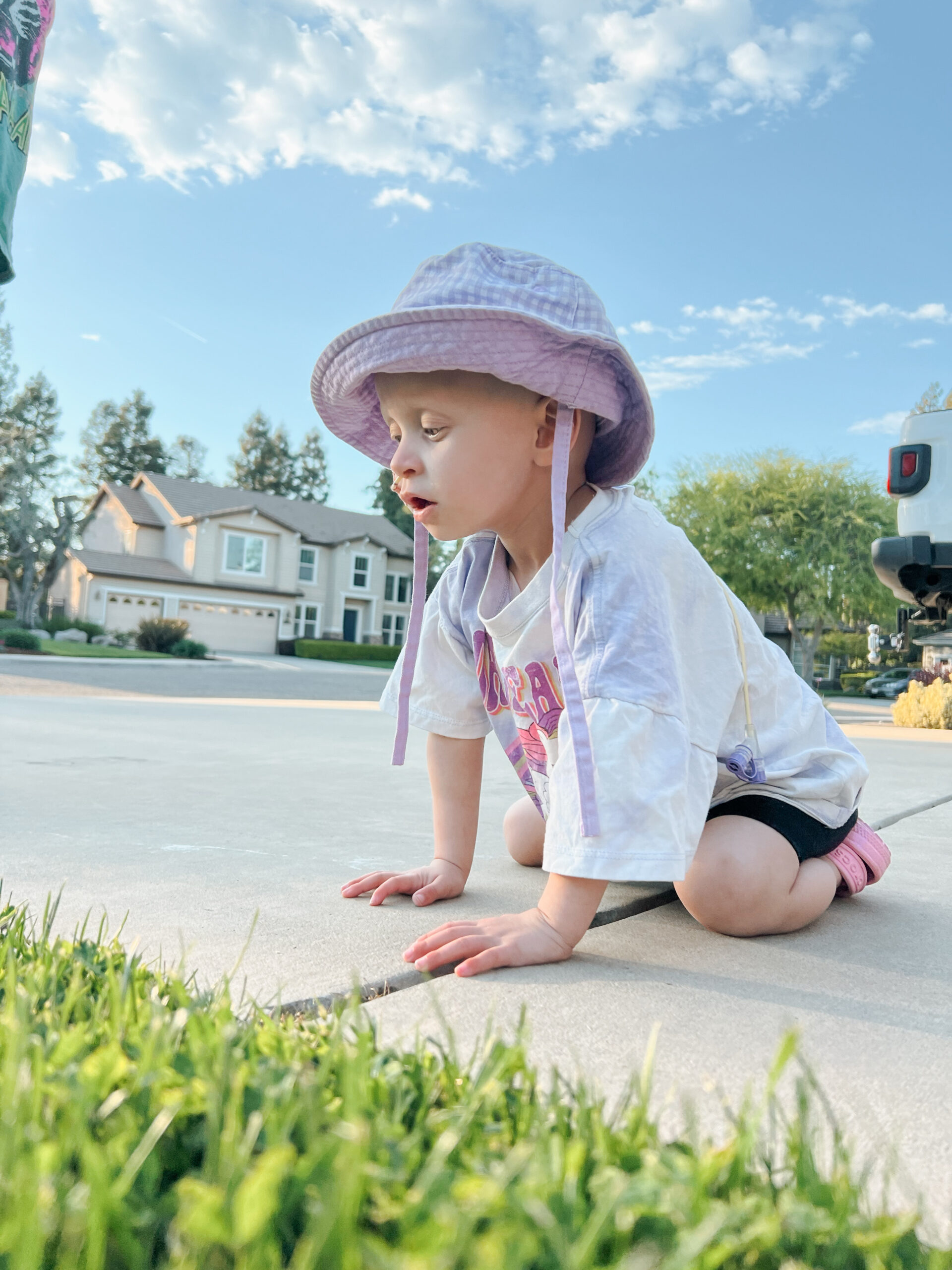 child on sidewalk