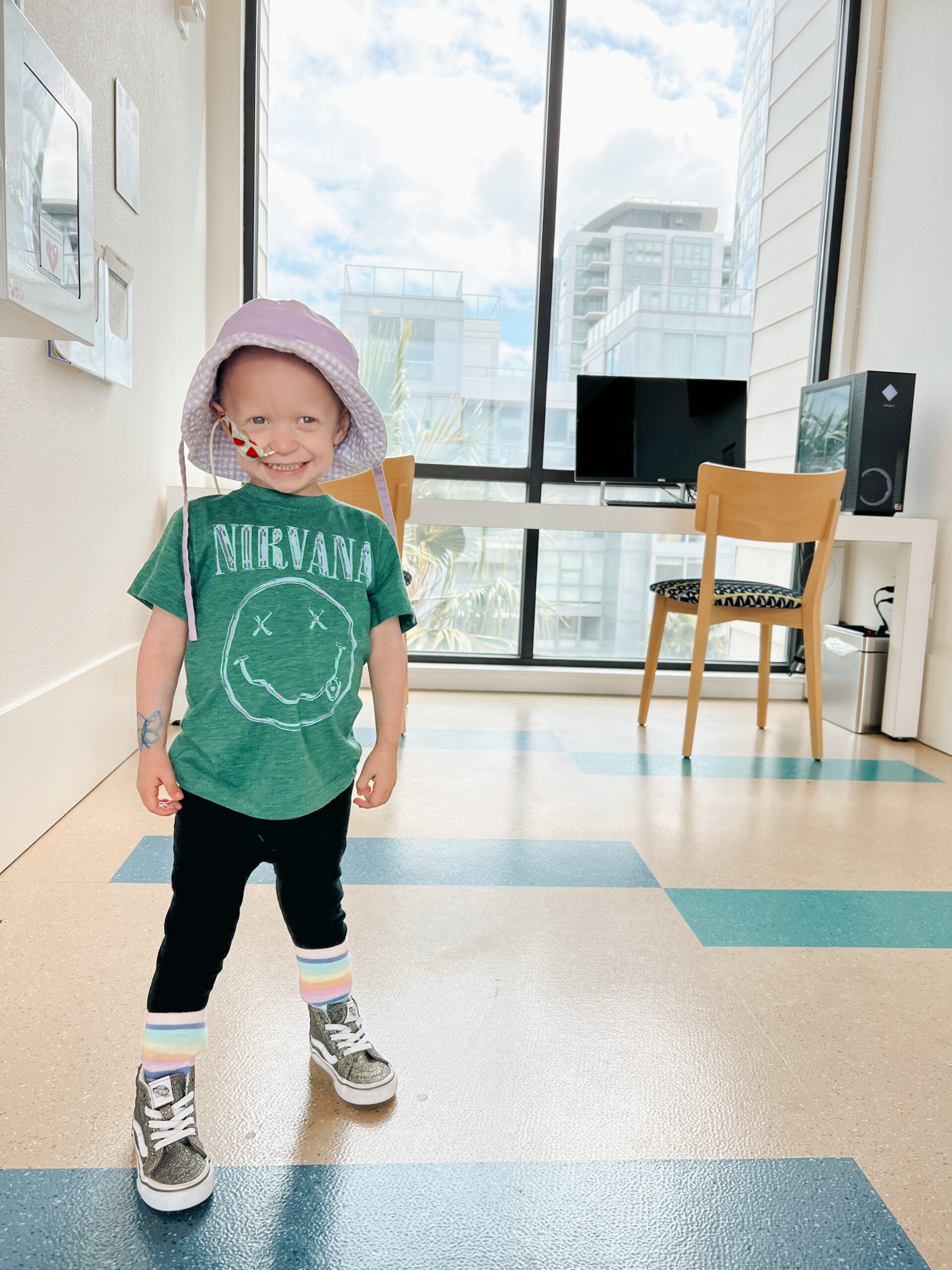child in green shirt