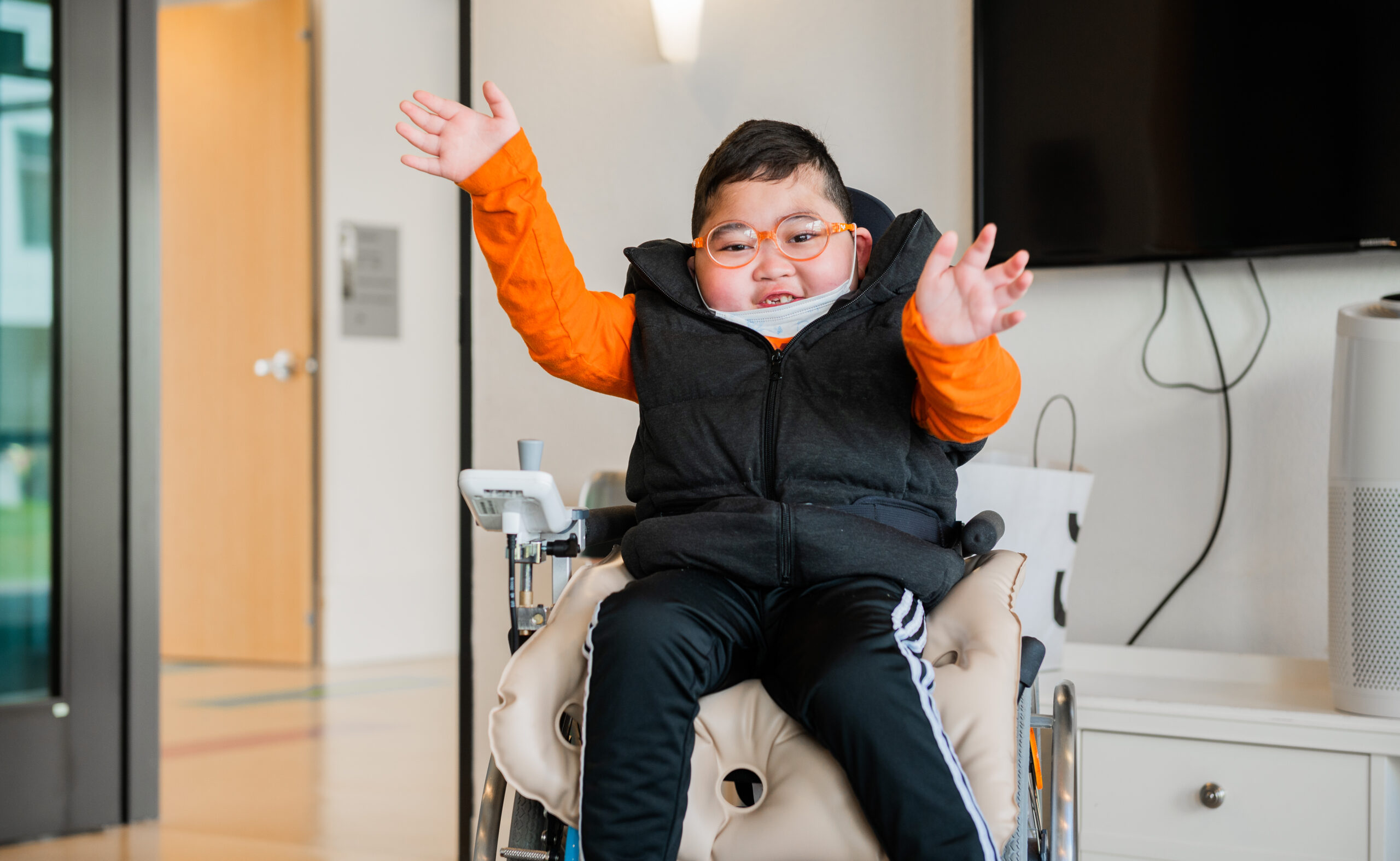 boy with arms out