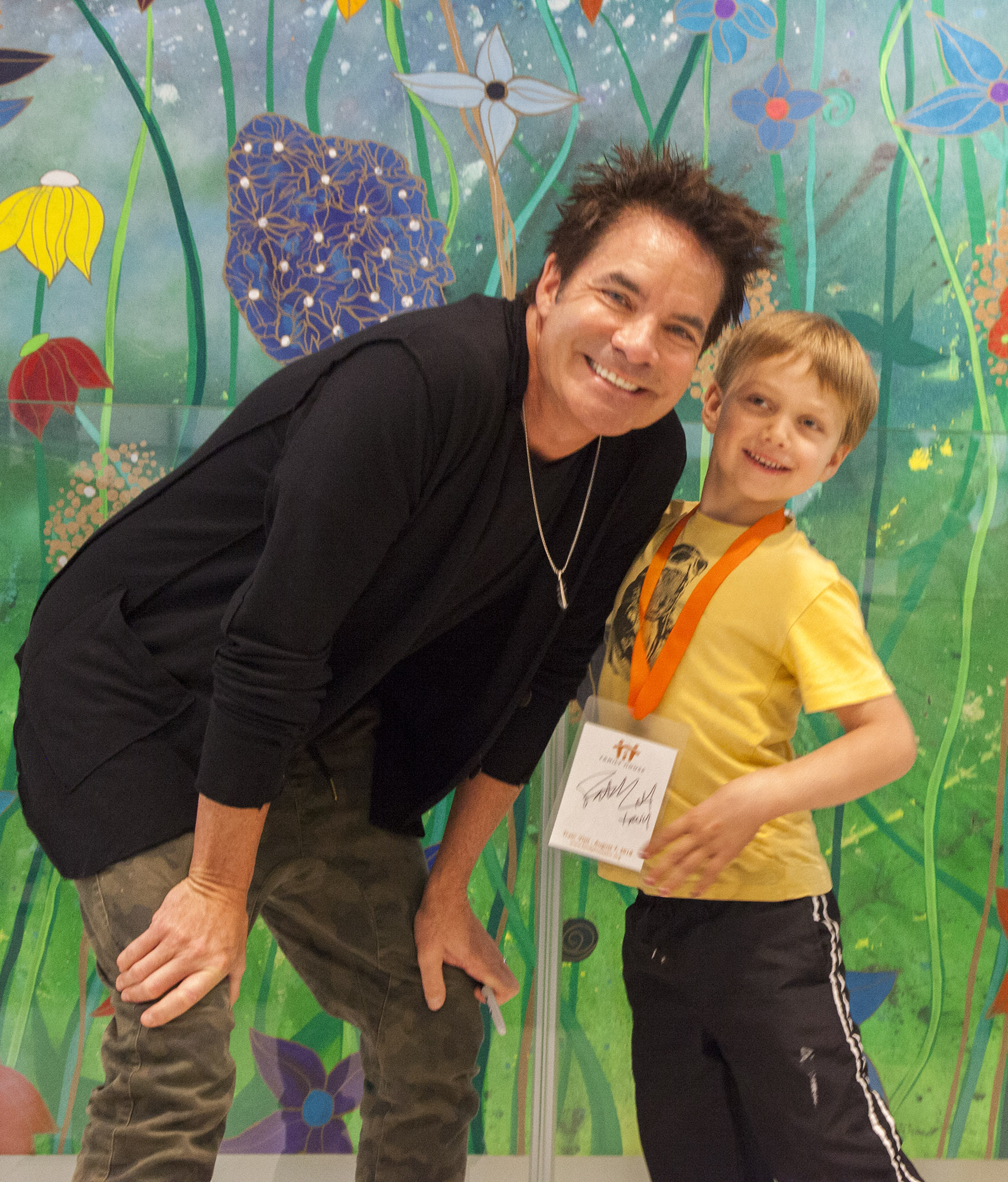 Pat Monahan with a smiling child