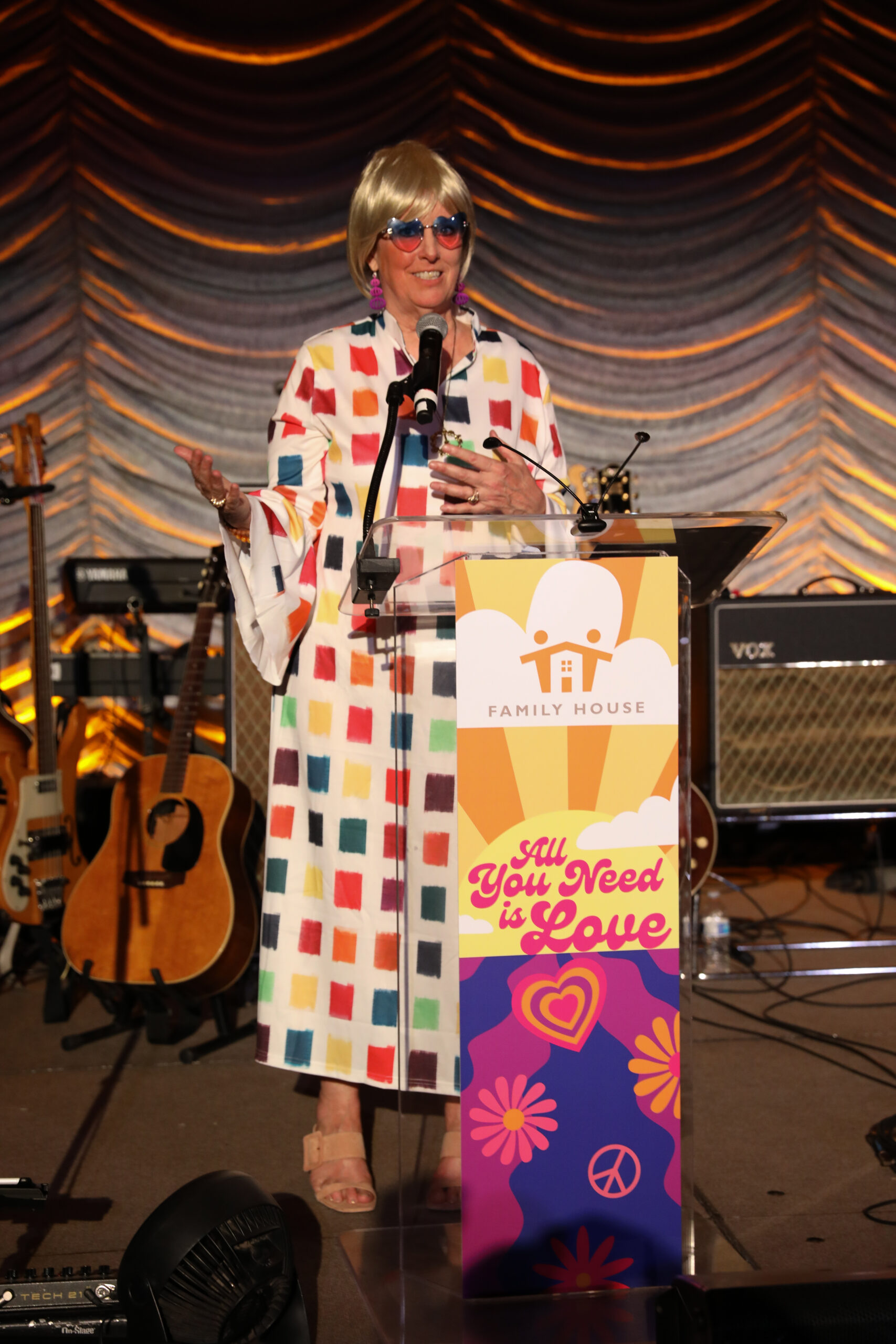 woman talking onstage